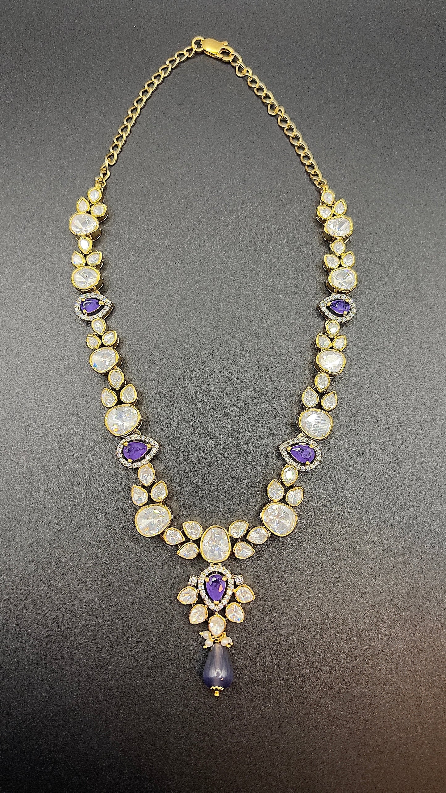 Moissanite "Tear Drop" Set With Amethyst Stone