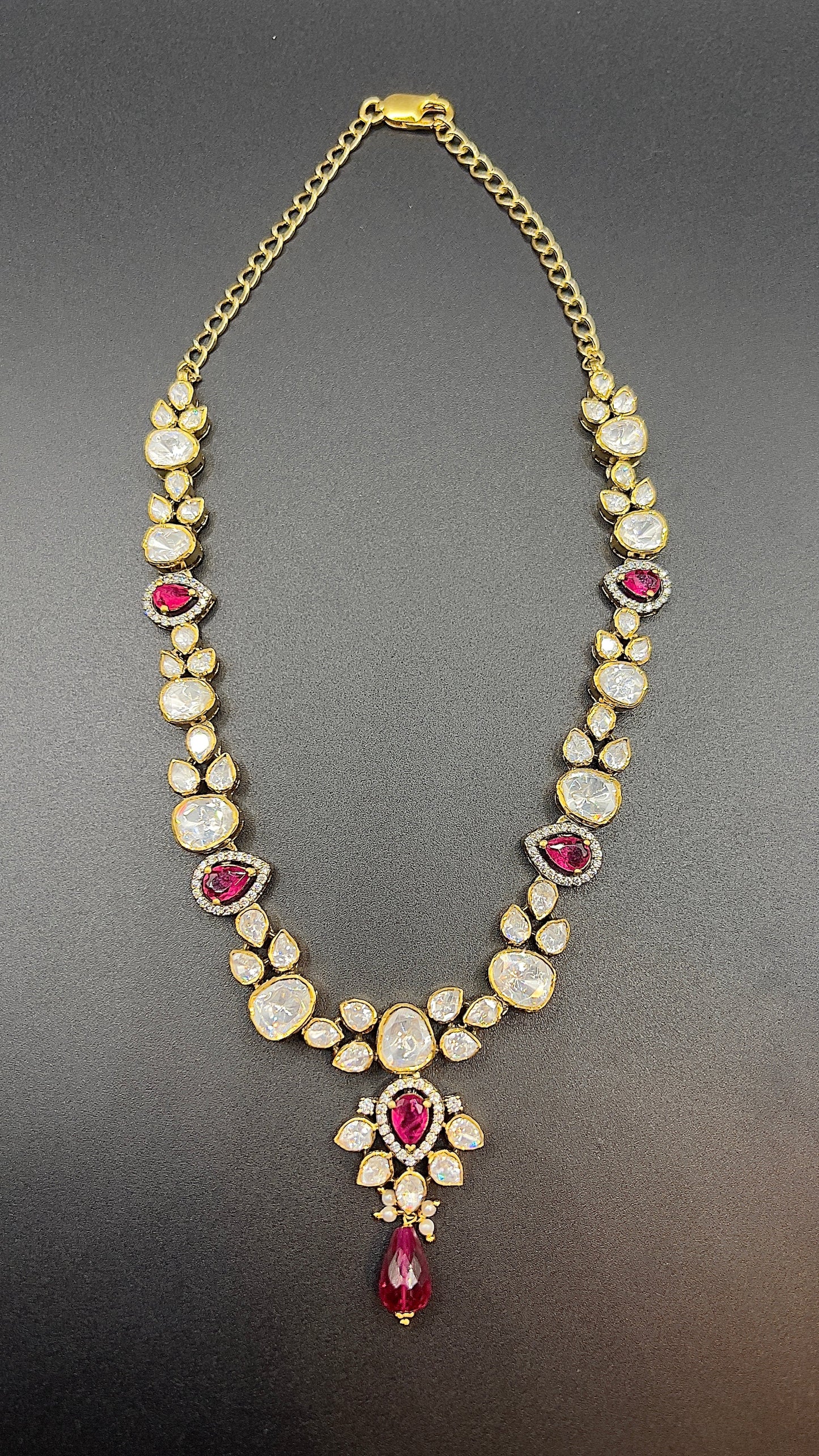 Moissanite "Tear Drop" Set With Pink Ruby