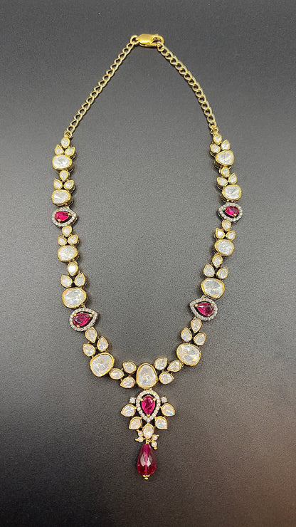 Moissanite "Tear Drop" Set With Pink Ruby