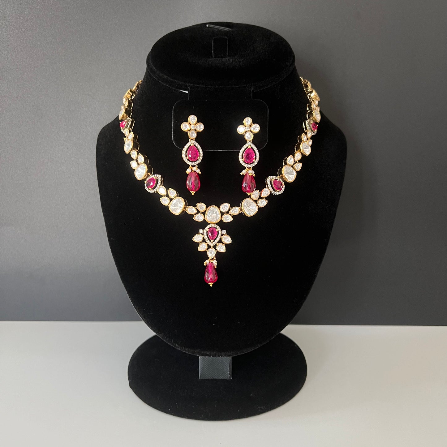 Moissanite "Tear Drop" Set With Pink Ruby