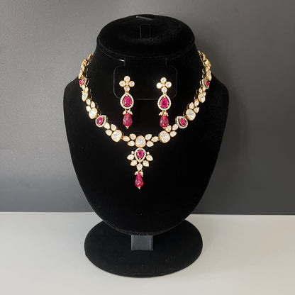 Moissanite "Tear Drop" Set With Pink Ruby