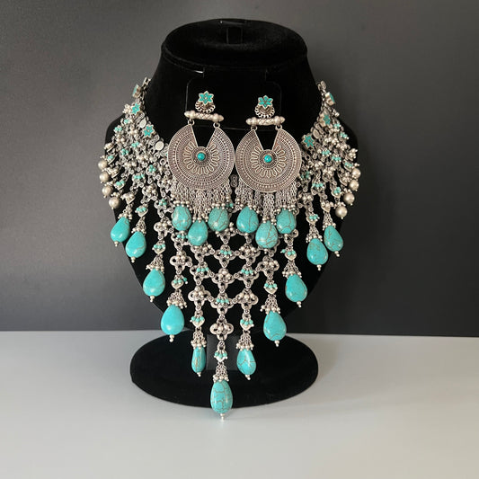 Moissanite "Fringe" Set With Sky Blue Topaz Stones